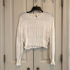 Stylish white long sleeved crop